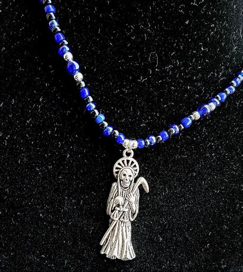 santa muerte necklace|santa muerte statue near me.